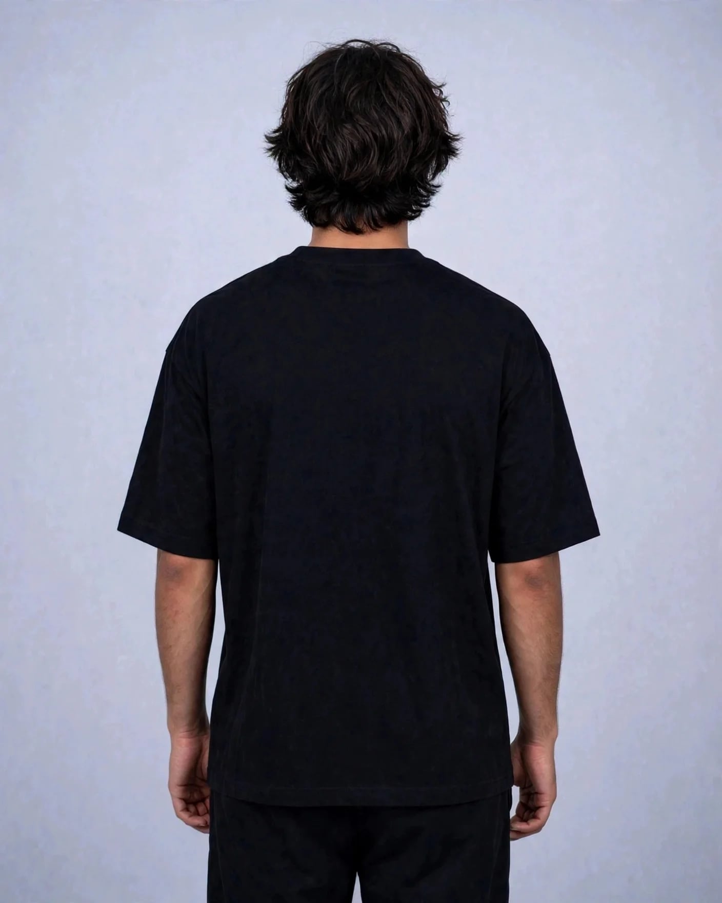 Back view of the black VEXOR metal logo tee, plain back